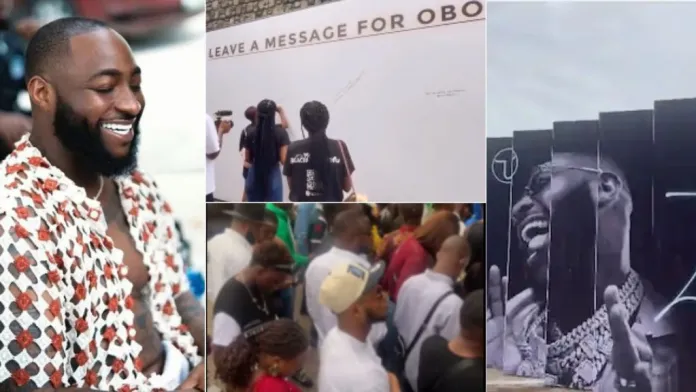 Checkout sweet moment fans pen messages to davido as they arrive ‘timeless’ concert in lagos (video)