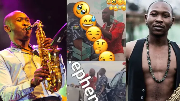 “this is an assault” – reactions as singer seun kuti lands huge slap on a police officer in lagos (video)
